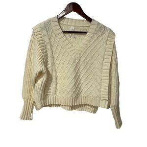 Women’s cream color knit swea size XS fits bigger